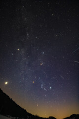 Orion constellation, zodiacal light and Milky Way stars on a dark countryside skies. © astrosystem