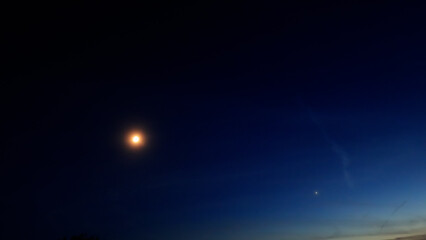 Moon, planet conjunction and stars in blue hour time. © astrosystem