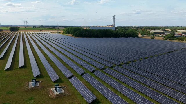 Aerial view of vast solar farm and Sutton Bridge gas power station in rural Lincolnshire UK