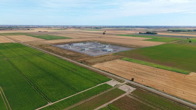 Aerial view of Triton Knoll offshore wind farm onshore substation in expansive rural fenland Lincolnshire UK