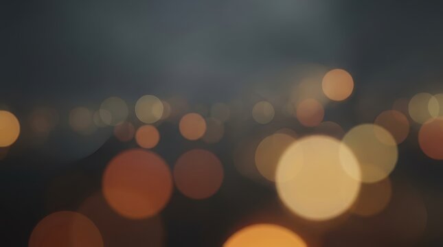 Warm golden bokeh orbs float across a dark moody night background providing a soft abstract texture