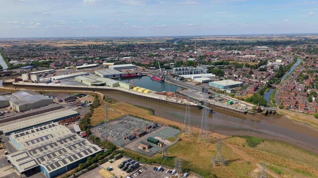 Aerial view of commercial cargo port and ships docked on River Witham in Boston Lincolnshire UK