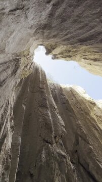 Looking Up at the Endless Blue Sky from a Deep Mountain Snow Basin