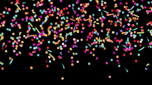 Bright festive confetti pieces showering creating an exciting celebratory atmosphere.