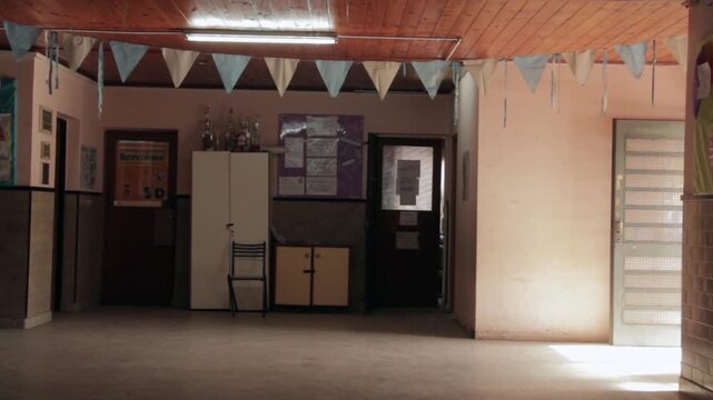 Interior Hallway Of Empty Argentine Public School Decorated With Bunting 