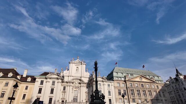 Aesthetic cinematic slow motion view of Kirche am Hof facade and square Vienna