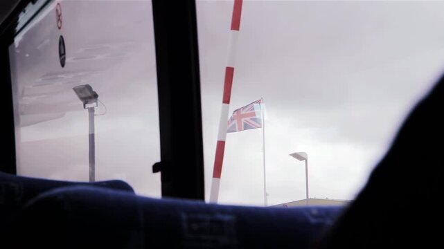 British Flag Waving Outside Passenger Bus Window From Airport In Falkland Islands (Islas Malvinas) - 4K