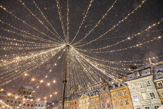 Magical Christmas Lights and Snowfall in Warsaw Old Town Market Square.
