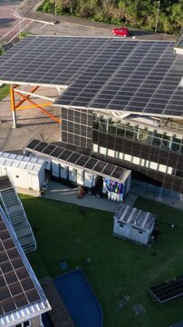 Solar Energy Research Facility with Rooftop and Ground-Mounted Photovoltaic Panels in Florian&oacute;polis, Brazil. Aerial View.