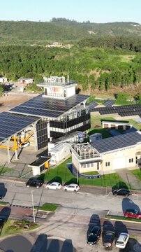 Solar Energy Technology Center with Rooftop Solar Panels, Ground-Mounted Arrays and Photovoltaic Research Systems in Florian&oacute;polis, Brazil. Aerial View.