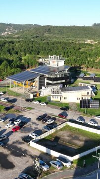 Solar Energy Technology Center with Rooftop Solar Panels, Ground-Mounted Arrays and Photovoltaic Research Systems in Florian&oacute;polis, Brazil. Aerial View.