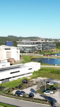Technology and Innovation Complex Surrounded by Forest, Lakes and Green Landscape in Northern Florian&oacute;polis, Brazil. Aerial View.