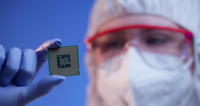 Scientist inspecting processor chip in cleanroom laboratory setting, concept control quality of semiconductor on lab of artificial intelligence factory banner.