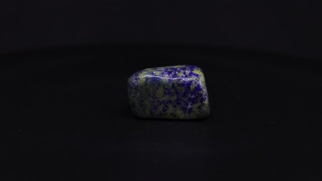lapis lazuli mineral from Afghanistan with black background