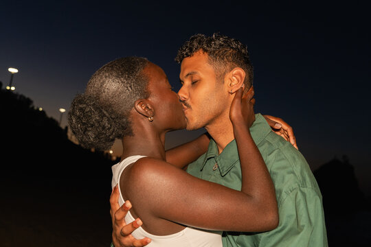 Couple Kisses During the Evening