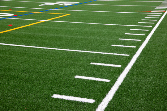 Green Artificial Turf field sideline 