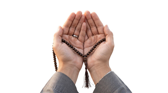 Human hands cupped together while holding brown wooden prayer beads for religious worship and spiritual meditation