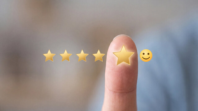 Customer rating and five star review satisfaction. Finger touching gold star with happy smiley emoji for excellent service quality, positive feedback, business and customer recommendation