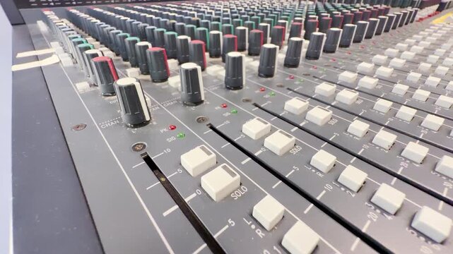 A vintage audio mixing console sits inside Lenfilm in Saint Petersburg. This classic sound equipment inspires nostalgic wonder and creative awe.
