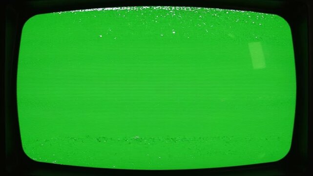 Nostalgic retro green screen static display, old monitor analog noise. Vintage television digital interference background