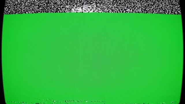 Retro television blank green screen displays analogue static noise, flickering signal, vibrant chroma key background, and abstract technology visuals