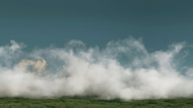 Low bank of realistic white mist rolling across a green field, featuring soft wispy textures and ample copy space for ethereal designs