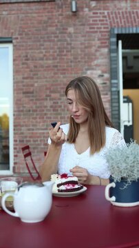 Vertical screen woman uses an injection pen beside a slice of cake reflecting modern peptide therapies for appetite regulation weight management and body composition care