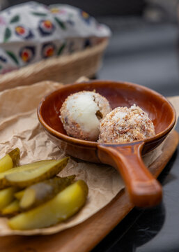 Traditional Polish Smalec Lard Spread with Pickles Served as Appetizer in Ceramic Dish