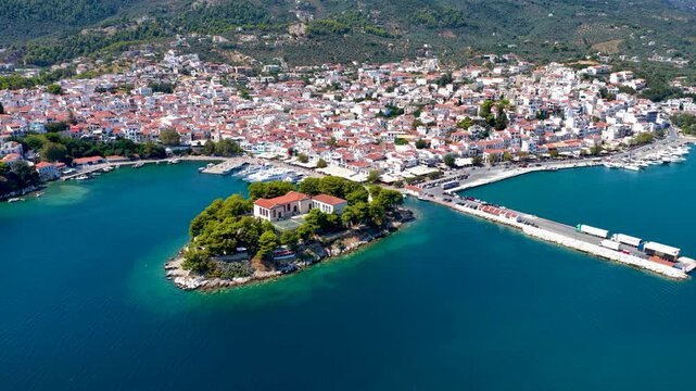 Establishing aerial view of the town at Skiathos island, Sporades, Greece, during a sunny summer day