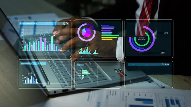 Holographic business analytics dashboard on laptop, Business professional using a laptop with transparent financial dashboard charts and analytics over office documents