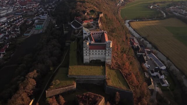 Drone shot of Willibaldsburg Castle overlooking Eichstaett, Bavaria, Germany. Preserved medieval hilltop fortress with observation points, stone towers, museums, and panoramic valley scenery.