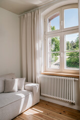 Obraz na płótnie Canvas Home heating with electric radiator in living room