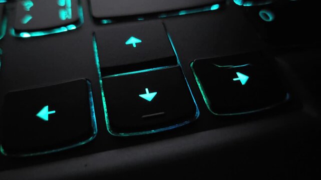 Close Up View of Backlit Laptop Arrow Keys