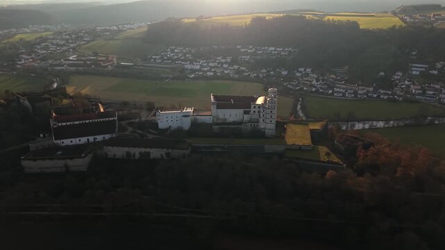 Aerial drone panorama of Willibaldsburg Castle in Eichstaett, Germany. Historic hilltop castle complex, cultural monument, and museum site overlooking the old town and Altmuehl Valley landscape.