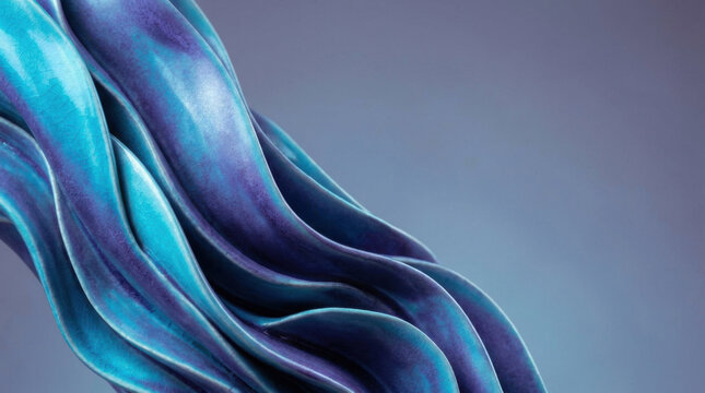 Abstract background featuring smooth flowing blue and purple silk fabric waves.