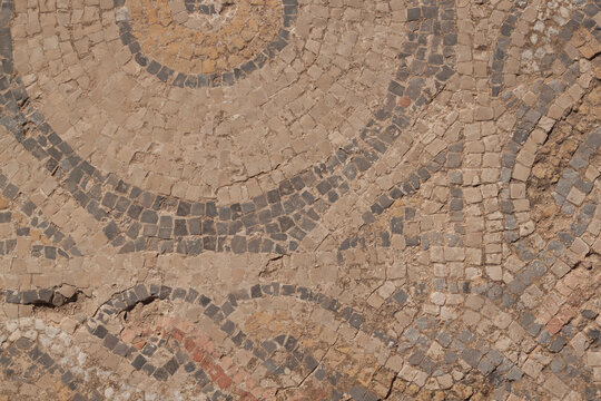 A background with a mosaic laid out many centuries ago