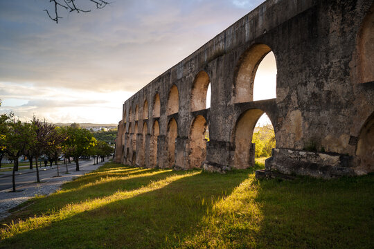 Aqueduct arches in Elvas Portugal at sunset