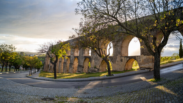 Aqueduct Arches and Trees in Elvas Portugal at Sunset