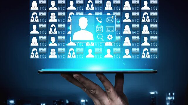 Futuristic Digital Interface Showcasing Virtual Profile Data of Multiple Users with Hand Holding a Tablet in a Dark Urban Setting. Entropy.