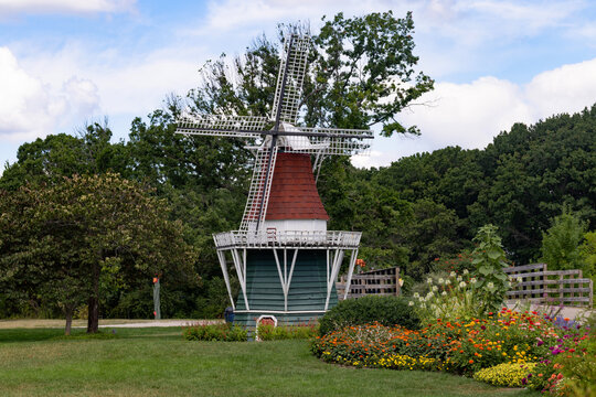 Visit to Windmill Park in Holland Michigan Features a Windmill Surrounded by Flowers During Summer