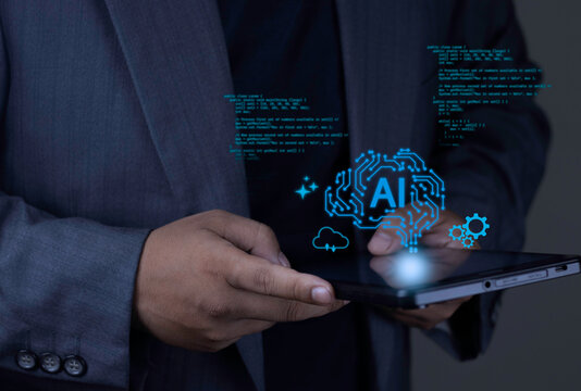 AI brain circuit and cloud computing concept with businessman hand interacting with tablet displaying glowing artificial intelligence hologram and cloud server icons on dark background.