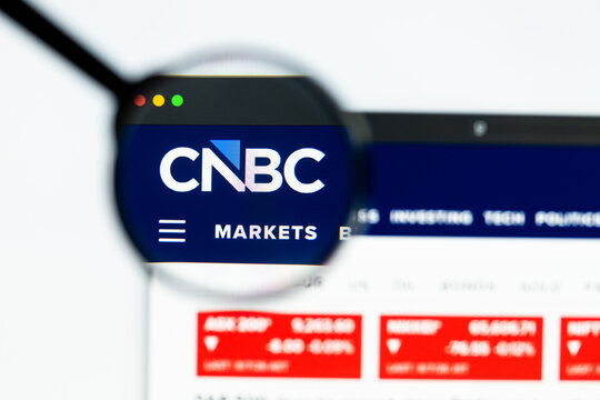 Milan, Italy 2026, 15 AGO Closeup of cnbc com website page on a laptop screen. Focus on cnbc com logo under a magnifying glass.