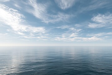 Fototapeta premium Open ocean horizon under wispy clouds on a clear day