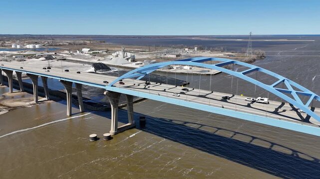 Orbital Aerial of leo frigo bridge in early spring over the fox river green bay wisconsin.