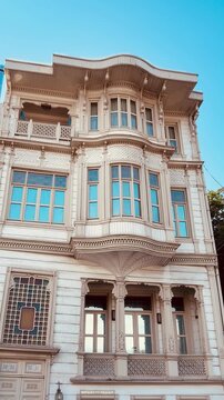 Exquisite lace wooden ornaments and ornate hand carved details on a historic Ottoman building facade in Sariyer, Istanbul. Traditional timber craftsmanship highlighting architectural heritage.