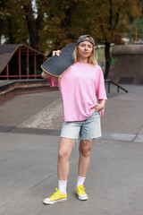 Stylish woman with skateboard in skate park © New Africa