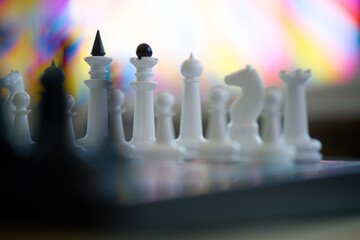 Close-up of chess pieces with shallow depth of field and bright abstract bokeh, symbolic image for planning, tactics and business strategy Photo © slexp880