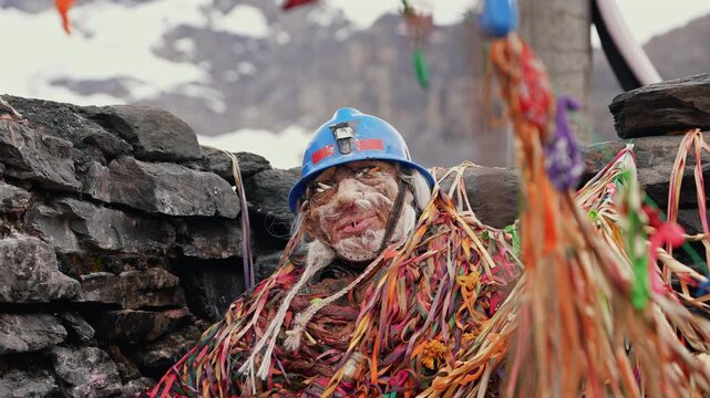 Miners Shrine Figure With Offerings in La Rinconada Peru