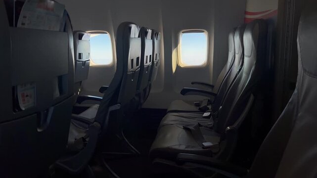 Interior of airplane seats and scenery from the plane window