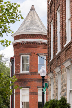 Summer sun shines on a historic Georgetown neighborhood of Washington, D.C., USA.